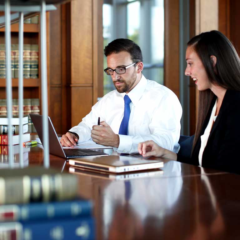 Students studying in the Ruth Lilly Law Library