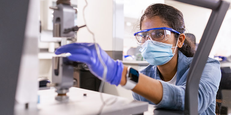 A student works in a biomedical engineering lab.